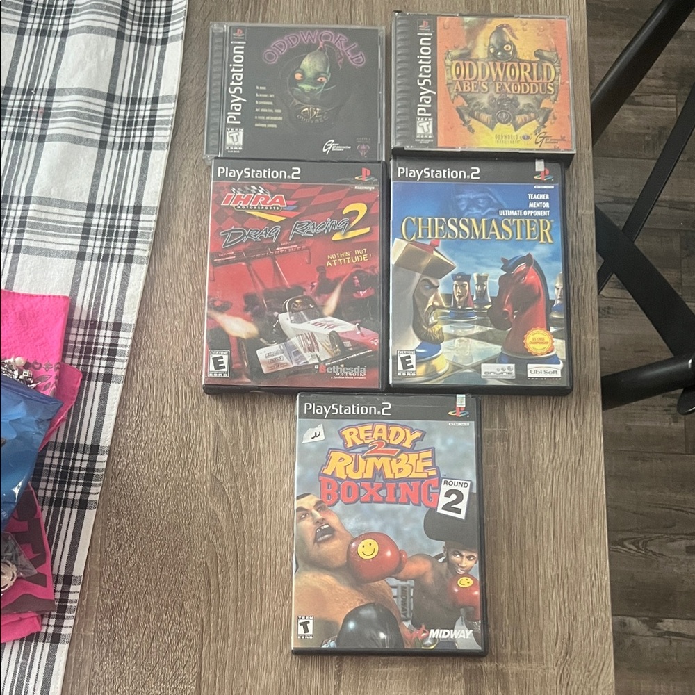 Sony PlayStation 2 Game Set - Black Cases